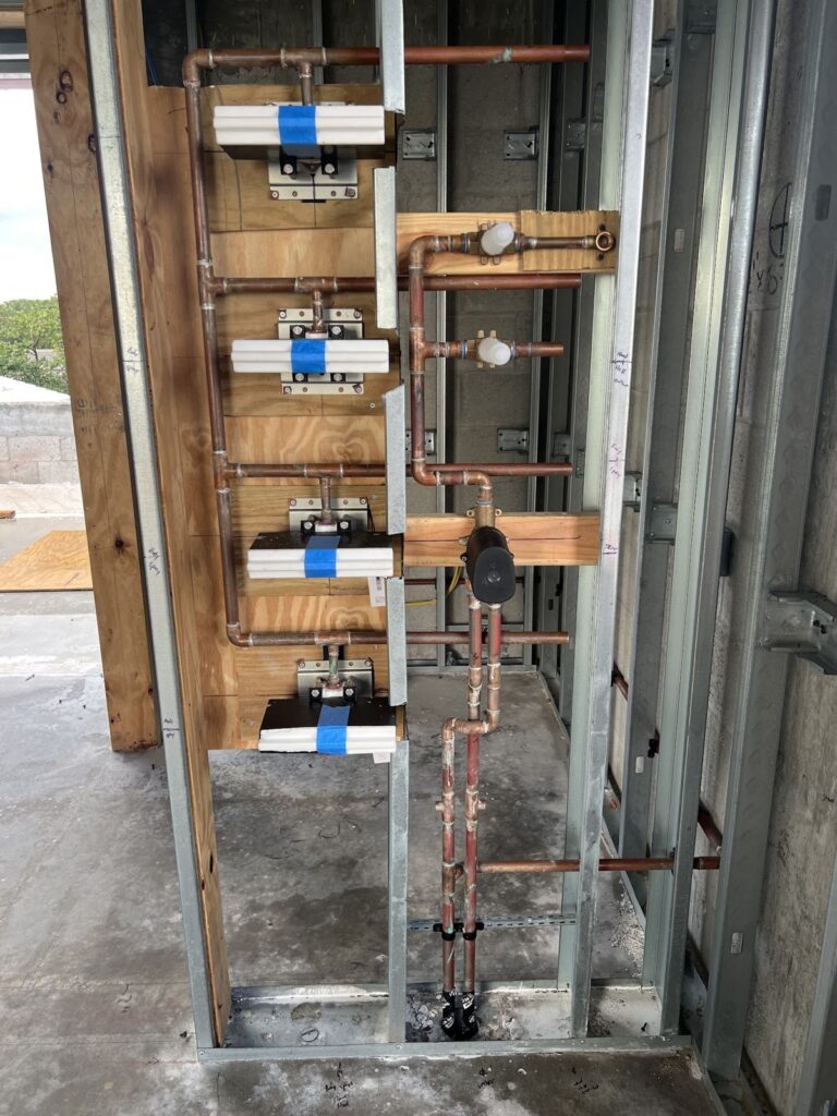 Multiple shower valves roughed in with copper supply lines